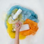 a pile of plastic bags and plastic bottles